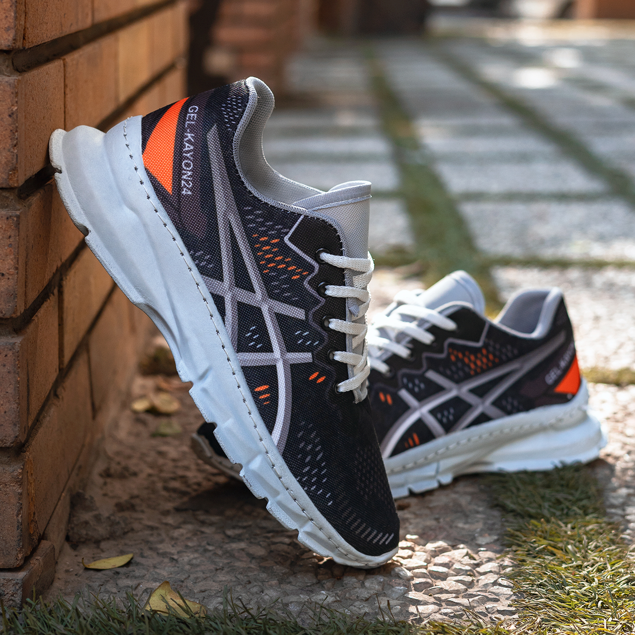 کفش مردانه اسیکس سرمه ای نارنجی مدل dahak