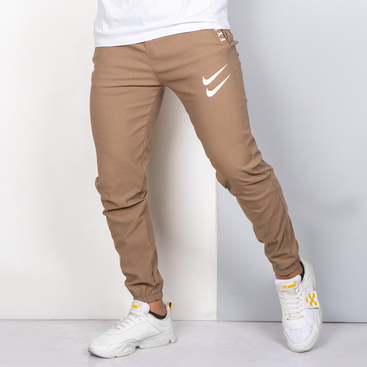 شلوار اسلش نایک کرم مردانه مدل manio