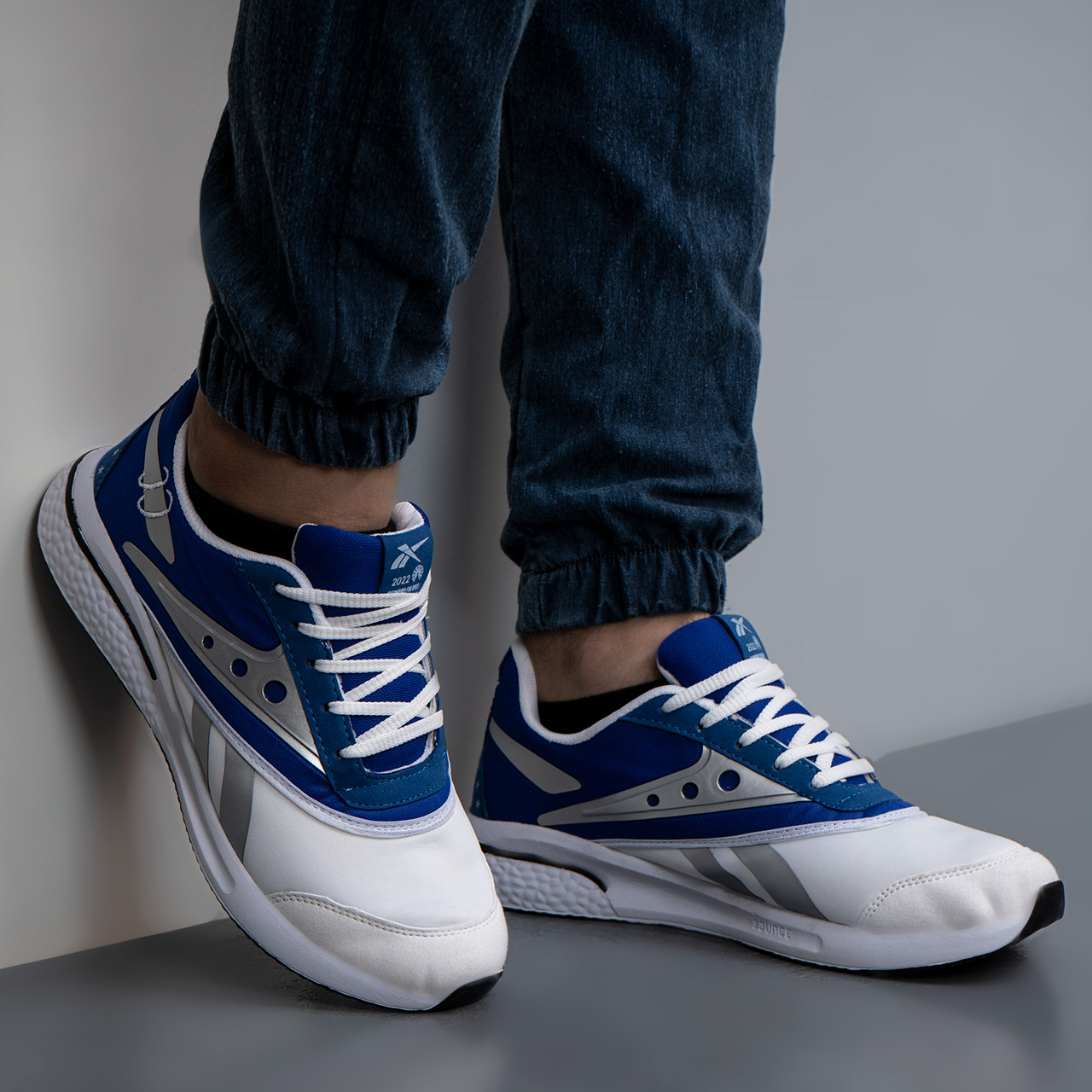 کفش ورزشی ریبوک سفید آبی مردانه مدل 25CC