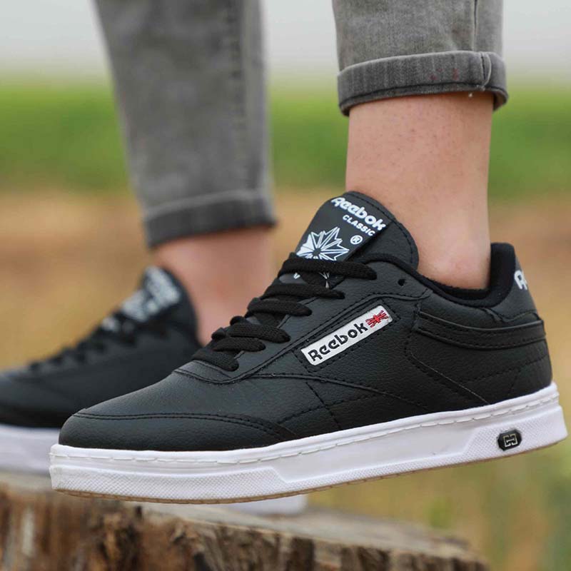 کفش ورزشی Reebok مردانه مشکی زیره سفیدمدل Flag