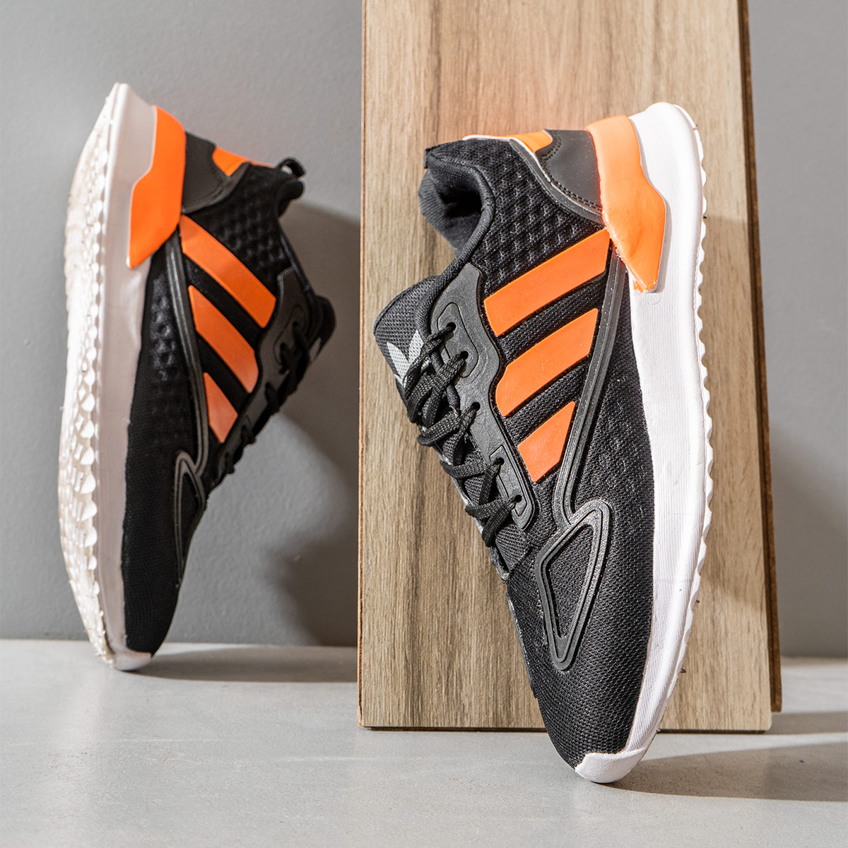 کفش ورزشی Adidas مردانه مشکی نارنجی مدل Siban