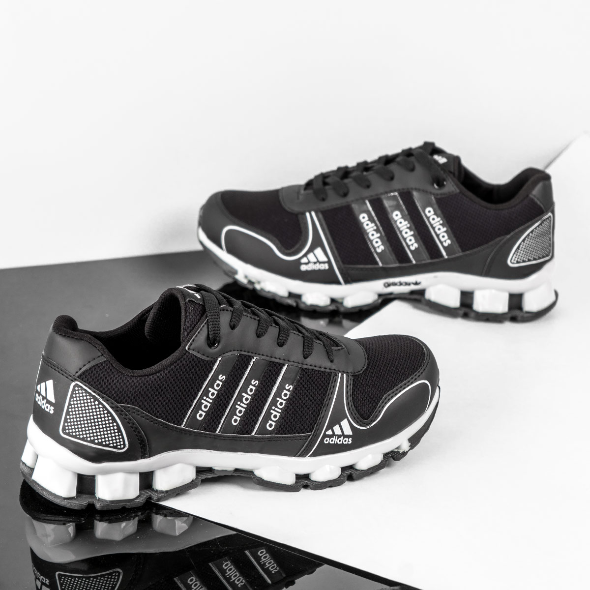 کفش ورزشی Adidas مردانه مشکی سفید مدل Artek